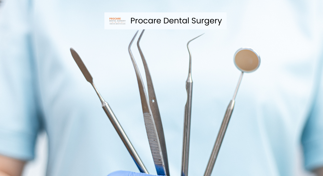 Professional dental instruments including a mirror, probe, and tweezers held by a clinician at a dental surgery in Pretoria.